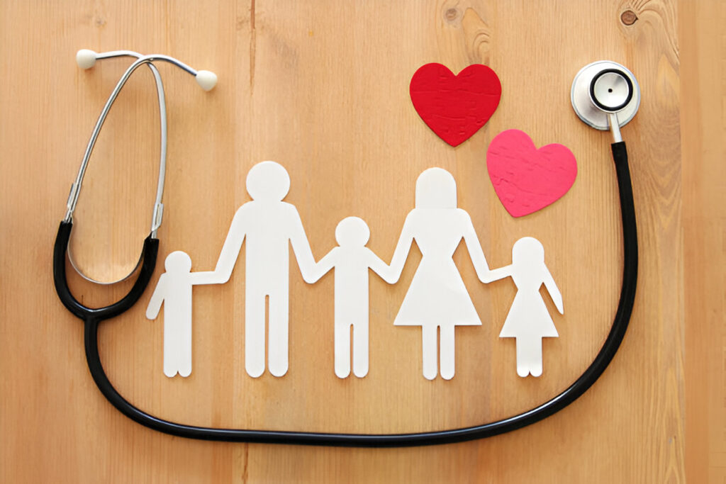 A stethoscope alongside a family cutout, symbolizing care and love, with hearts representing connection and health.